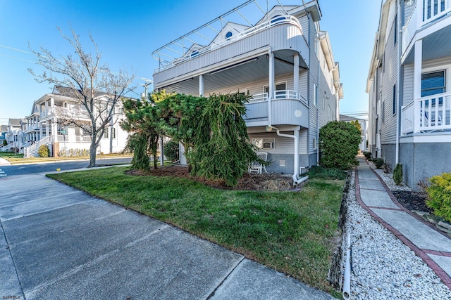 view of property exterior featuring a yard