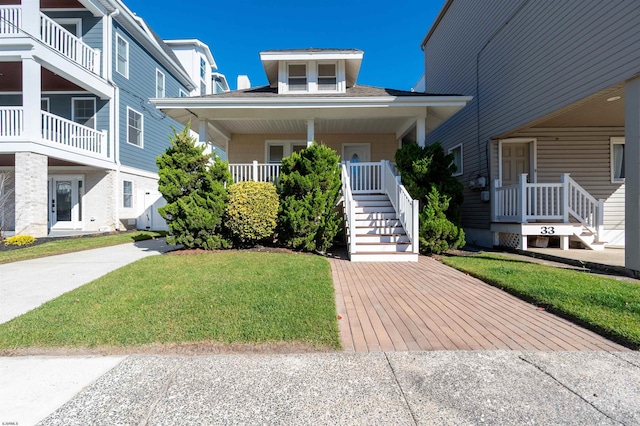 view of front of home with a front yard