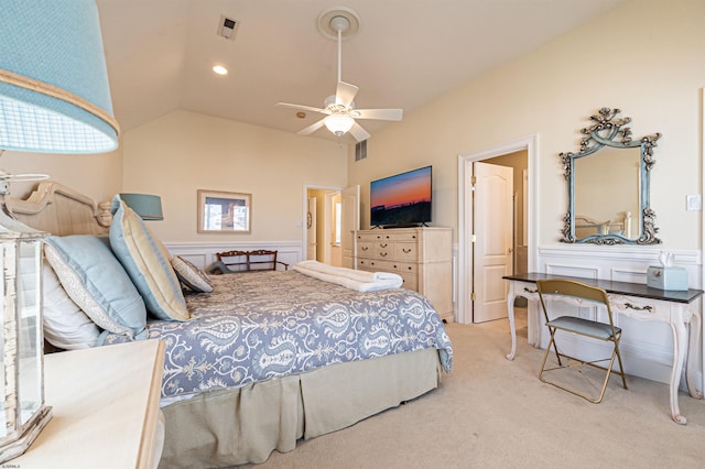 carpeted bedroom with ceiling fan and lofted ceiling