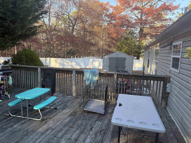 wooden deck with a storage unit