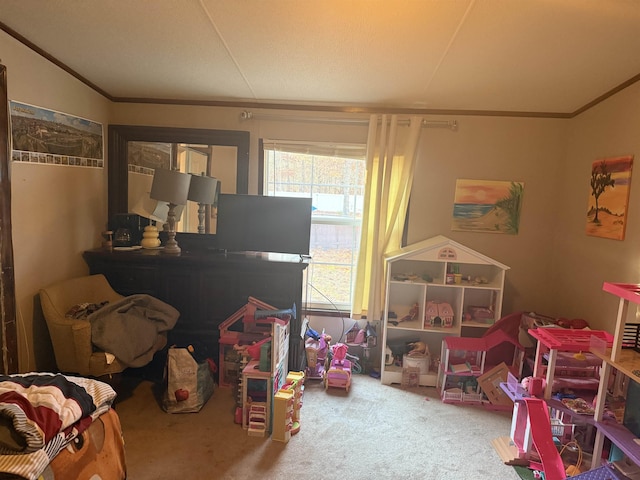 playroom featuring carpet, lofted ceiling, and ornamental molding