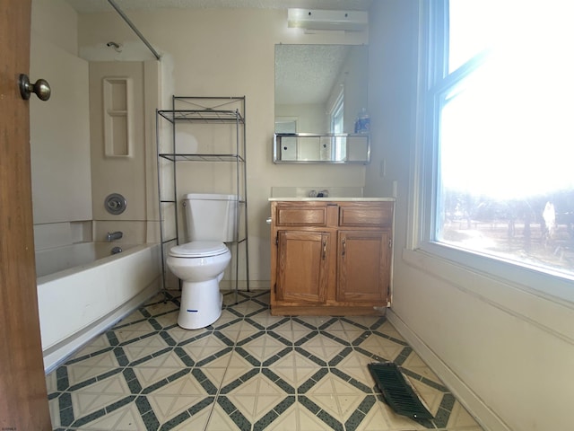 full bathroom with vanity, bathtub / shower combination, and toilet