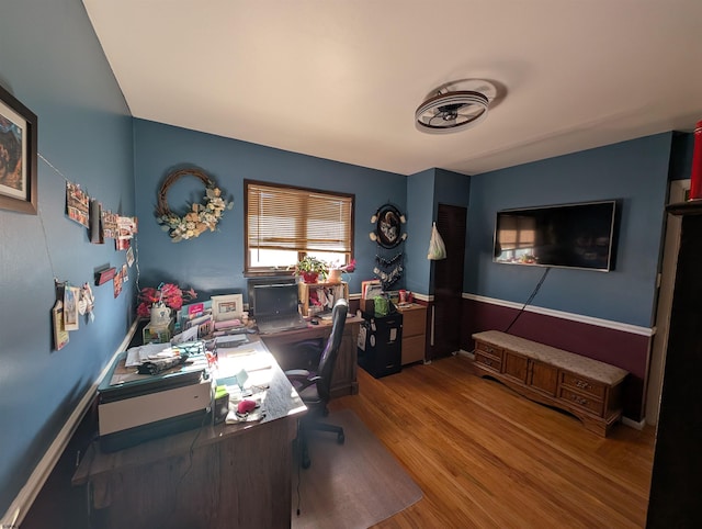 home office featuring wood finished floors