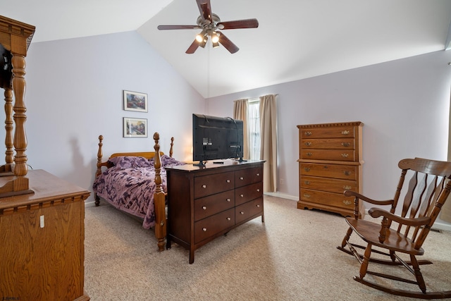 carpeted bedroom featuring ceiling fan and lofted ceiling