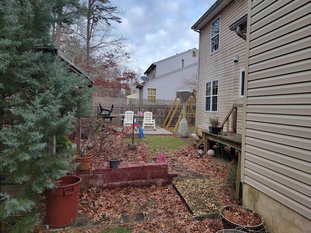 view of yard featuring a patio area and fence