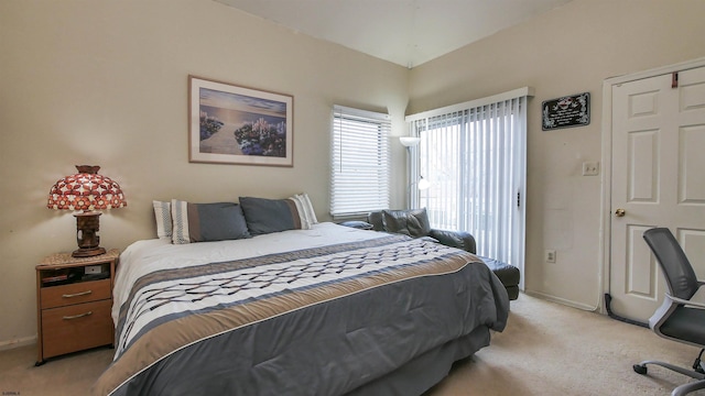 bedroom with light carpet