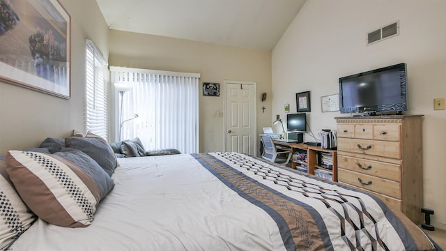 bedroom with lofted ceiling