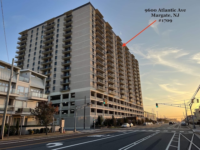 view of outdoor building at dusk