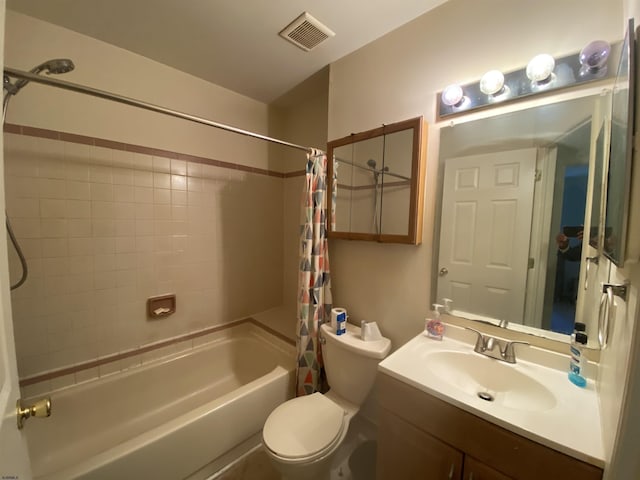 full bathroom featuring vanity, toilet, and shower / bathtub combination with curtain