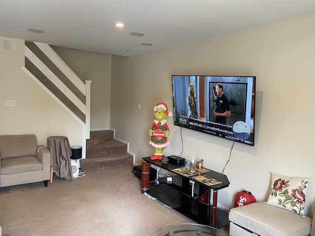 carpeted living room with vaulted ceiling