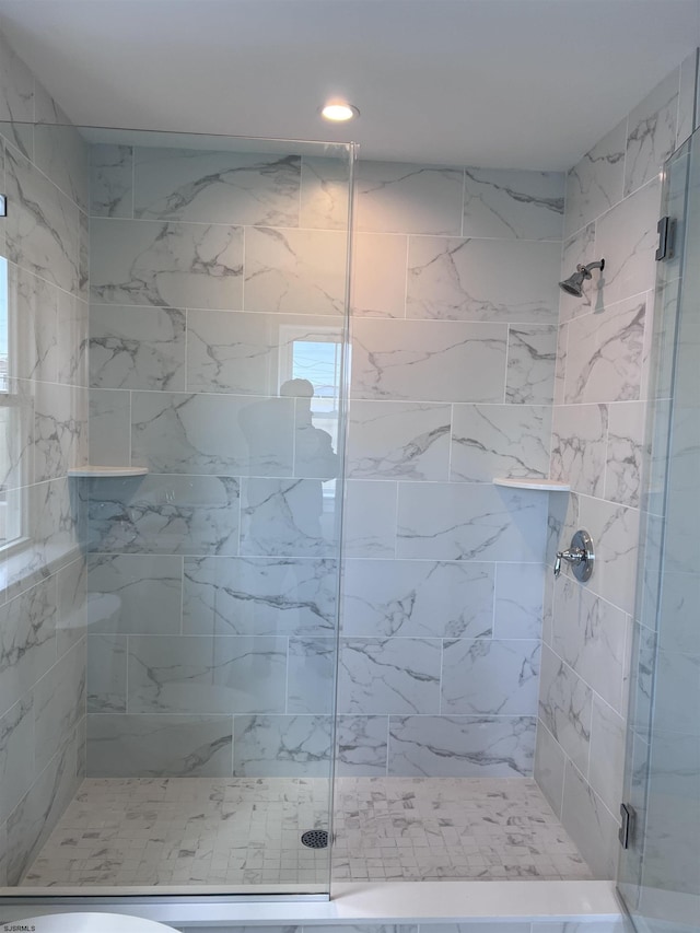 bathroom featuring walk in shower