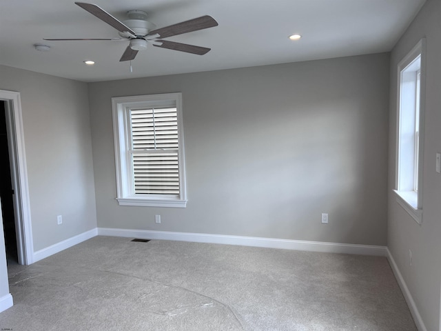 carpeted empty room with ceiling fan