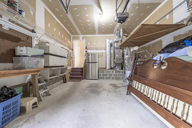 interior space featuring stainless steel fridge and a garage door opener