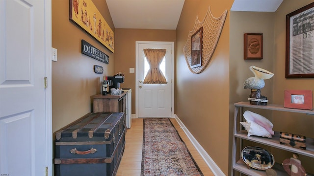 doorway featuring light wood-type flooring