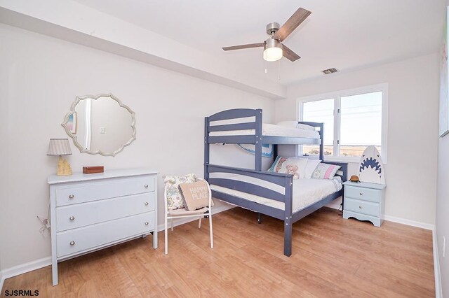 bedroom featuring ceiling fan and light hardwood / wood-style floors