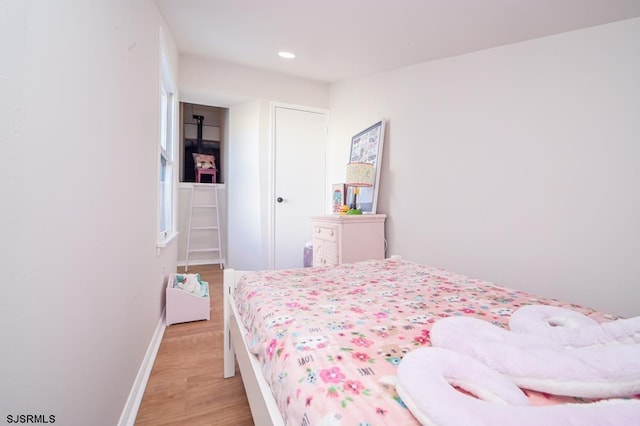 bedroom featuring light hardwood / wood-style floors