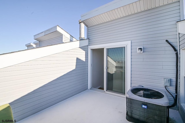 view of patio featuring cooling unit