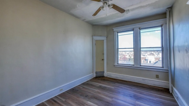 unfurnished room with ceiling fan and hardwood / wood-style flooring