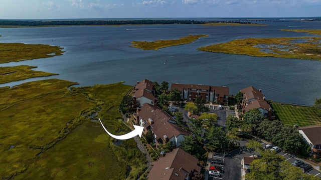 drone / aerial view featuring a water view