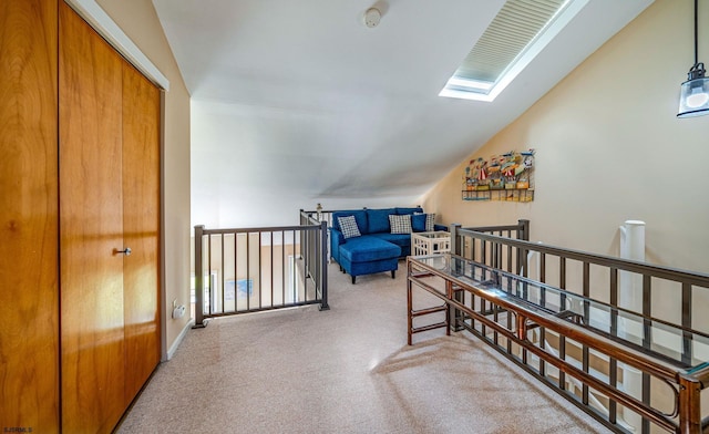 bedroom featuring a closet and vaulted ceiling with skylight