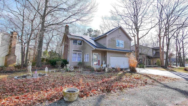 view of front of property featuring a garage