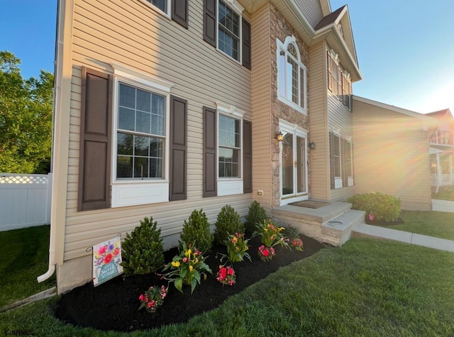 view of property exterior featuring a yard