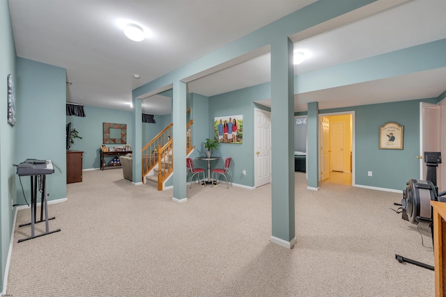 rec room with light carpet