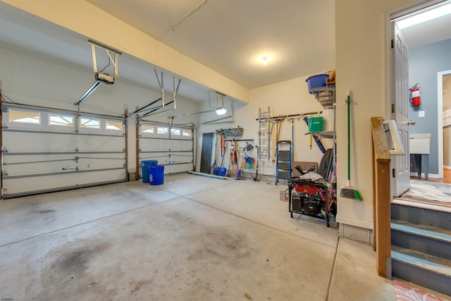 garage featuring a garage door opener