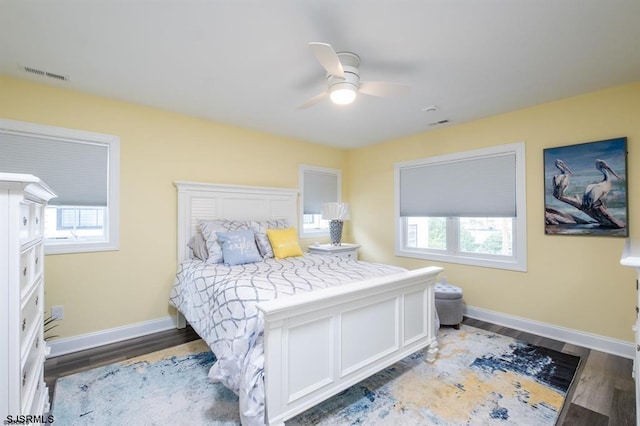 bedroom featuring ceiling fan and hardwood / wood-style floors