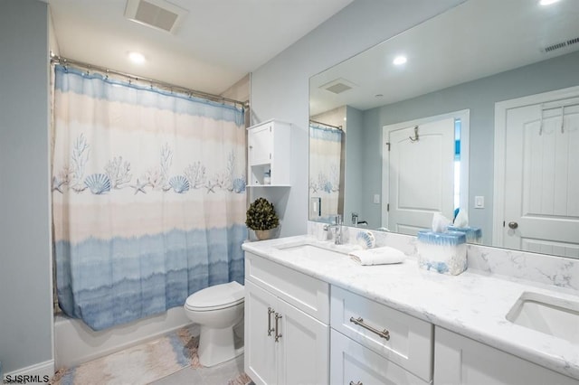 full bathroom featuring shower / bathtub combination with curtain, vanity, and toilet