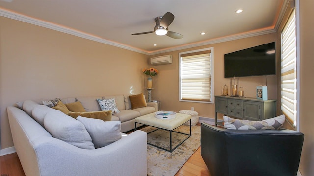 living room featuring a wall unit AC, ceiling fan, light hardwood / wood-style floors, and ornamental molding