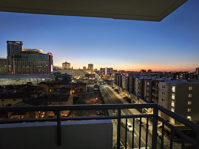 view of balcony at dusk