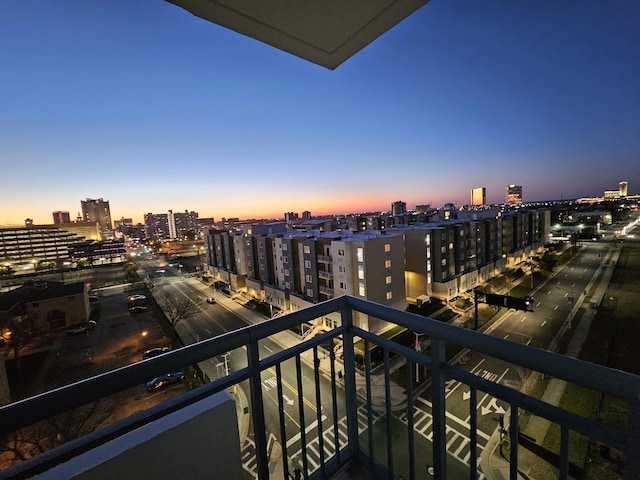 view of balcony at dusk