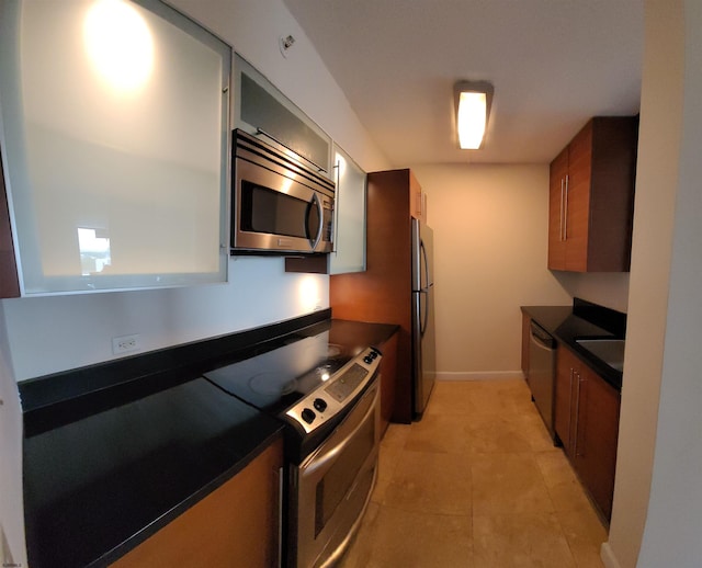 kitchen with appliances with stainless steel finishes and sink