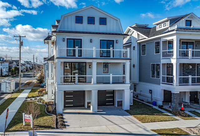 view of front of property with a balcony and a garage