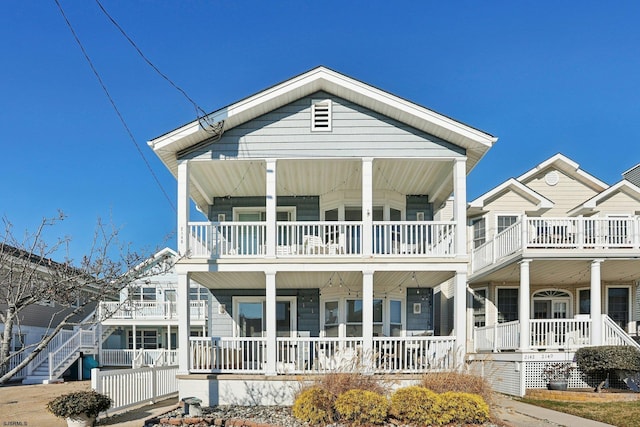 view of front of house with a balcony and a porch