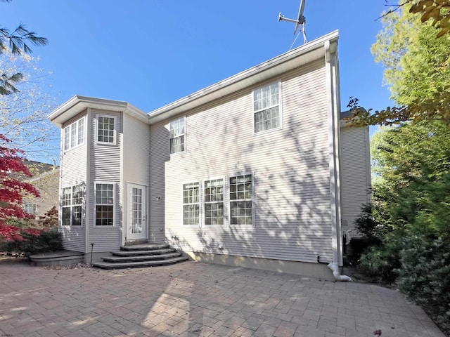 rear view of house with a patio area