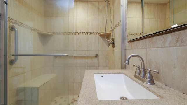 bathroom featuring vanity and walk in shower