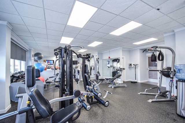 workout area featuring a drop ceiling