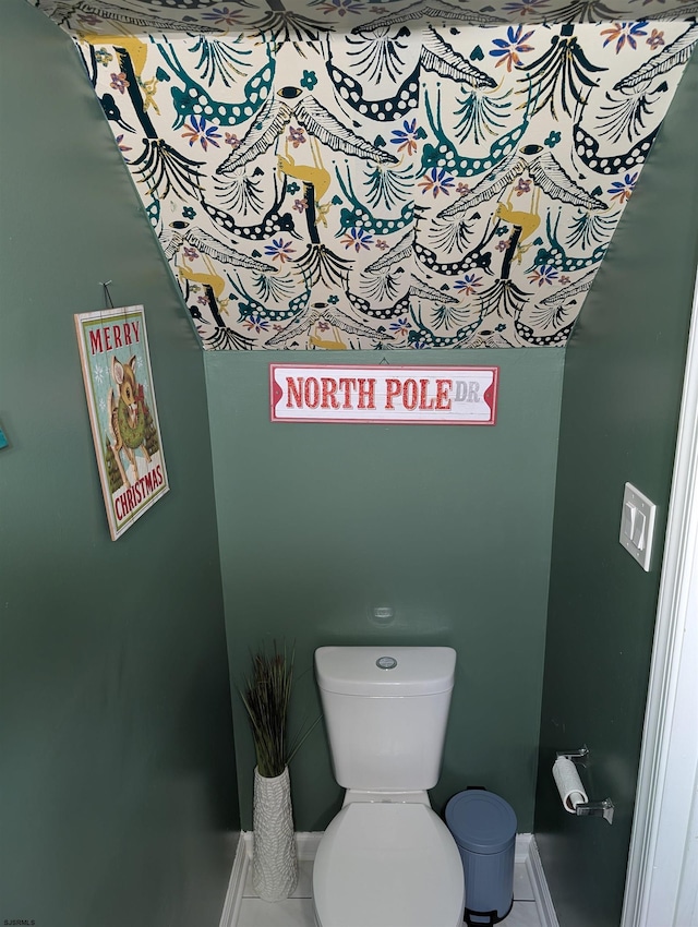 bathroom featuring tile patterned floors and toilet