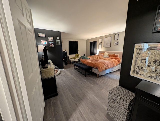 bedroom featuring hardwood / wood-style floors