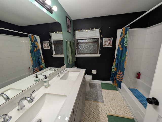 full bathroom with vanity, toilet, and shower / bathtub combination with curtain