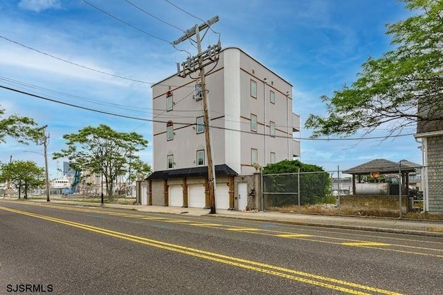 view of building exterior featuring a garage