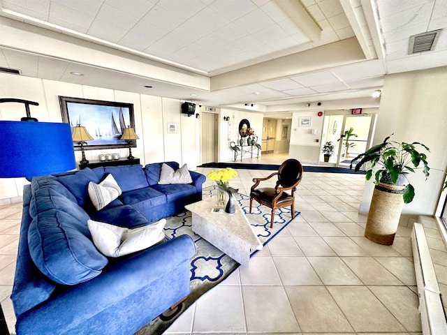 interior space featuring a tray ceiling and french doors