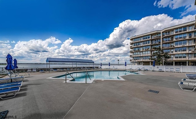 view of pool with a patio