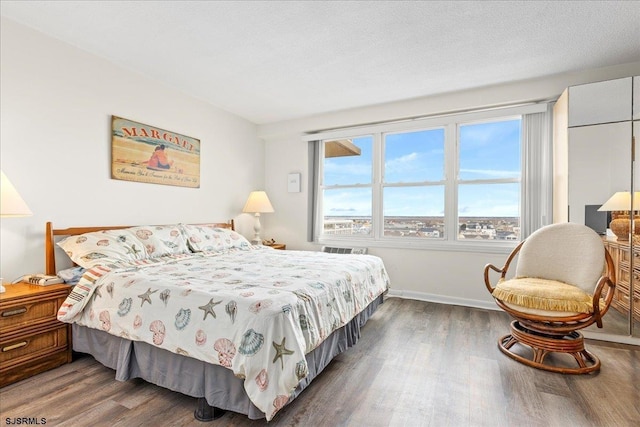 bedroom featuring dark wood-type flooring