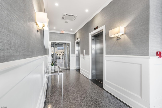 hallway featuring elevator and ornamental molding