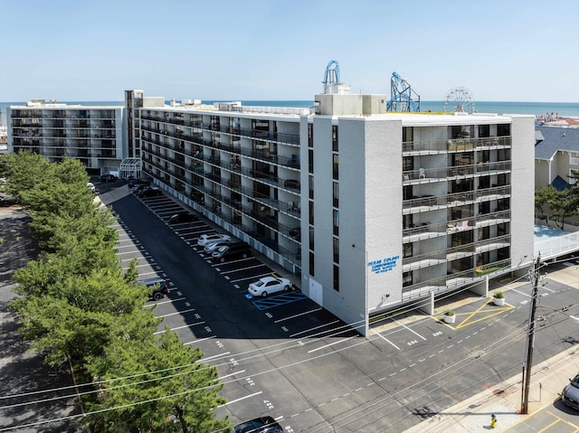 view of building exterior with a water view