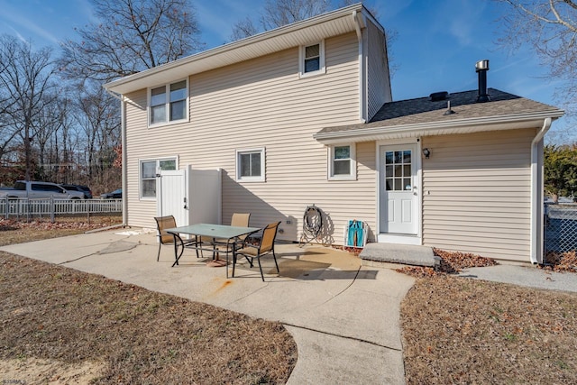 back of property featuring a patio