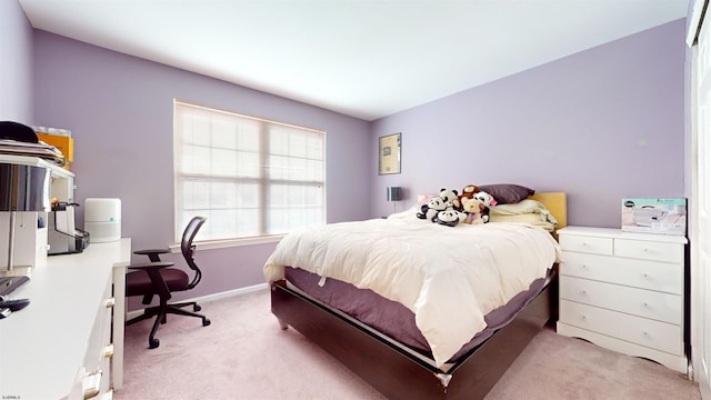 bedroom with light colored carpet